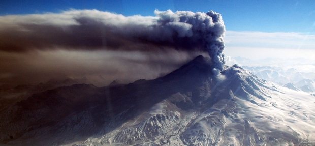 Redoubt volcano with minor ash eruption. Photograph taken during observation and gas data collection flight by AVO staff March 30, 2009.